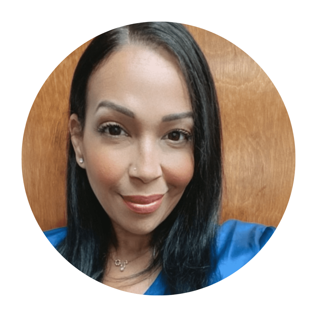 A woman with straight hair wearing a blue color dress